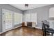 Breakfast nook with natural light from the door to the wooden outdoor deck at 3986 Harmony Walk Se Way, Smyrna, GA 30082