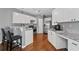 Eat-in kitchen with stainless steel appliances, granite countertops, and modern lighting at 3986 Harmony Walk Se Way, Smyrna, GA 30082
