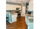 Bright kitchen featuring white cabinets, granite countertops, and stainless steel appliances at 3986 Harmony Walk Se Way, Smyrna, GA 30082