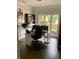 Office space with large windows, a desk, and a bookcase; bathed in natural light at 3986 Harmony Walk Se Way, Smyrna, GA 30082