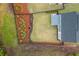This image displays the home's fenced backyard, featuring lush lawn and landscape beds at 1011 Ridgeview Rd, Woodstock, GA 30188