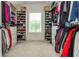 Spacious walk-in closet with custom shelving and ample hanging space, designed for organized storage and easy access at 1011 Ridgeview Rd, Woodstock, GA 30188
