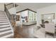 Spacious living room and dining area featuring modern design and hardwood floors at 1011 Ridgeview Rd, Woodstock, GA 30188