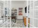 Stylish home office with ample natural light, modern furniture, and a comfortable workspace at 1011 Ridgeview Rd, Woodstock, GA 30188