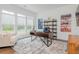 Bright and airy home office with a large desk and ample natural light at 1011 Ridgeview Rd, Woodstock, GA 30188