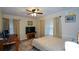 Comfortable bedroom with a bed, dresser, and work desk at 1245 Briar Hills Ne Dr, Atlanta, GA 30306