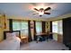 This is a cozy bedroom that can be used for guests or Gathering at 1245 Briar Hills Ne Dr, Atlanta, GA 30306