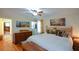 Spacious bedroom with hardwood floors and view to ensuite bathroom and kitchen at 1245 Briar Hills Ne Dr, Atlanta, GA 30306