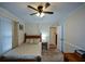 Bedroom with a bed, side table, and door to another room at 1245 Briar Hills Ne Dr, Atlanta, GA 30306