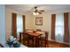 Classic dining room featuring a wooden table, chairs, and elegant window treatments at 1245 Briar Hills Ne Dr, Atlanta, GA 30306