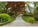 Charming brick home with landscaped yard and mature trees; idyllic suburban setting at 1245 Briar Hills Ne Dr, Atlanta, GA 30306
