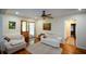 Comfortable living room features hardwood floors, ceiling fan and neutral paint at 1245 Briar Hills Ne Dr, Atlanta, GA 30306