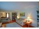 Open-concept living room with hardwood floors, bright lighting, and comfortable seating area at 1245 Briar Hills Ne Dr, Atlanta, GA 30306