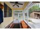 Enclosed patio with lots of light, with an adjacent outdoor building and views of the backyard at 1245 Briar Hills Ne Dr, Atlanta, GA 30306