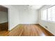 Spacious bedroom with hardwood floors, lots of natural light and modern lighting at 558 Larchmont Nw Dr, Atlanta, GA 30318