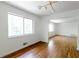 Bright dining area with hardwood floors and a large window, perfect for enjoying meals at 558 Larchmont Nw Dr, Atlanta, GA 30318