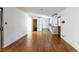 Spacious living room with hardwood floors and neutral-colored walls at 558 Larchmont Nw Dr, Atlanta, GA 30318