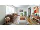 Cozy living room featuring stylish decor, hardwood floors, and comfortable seating at 558 Larchmont Nw Dr, Atlanta, GA 30318