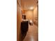 A bathroom featuring wood-style floors, a vanity with sink, and a modern toilet at 1406 High Sierra Dr, Lawrenceville, GA 30043