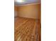 Cozy bedroom showcasing beautiful hardwood floors and ample natural light at 1406 High Sierra Dr, Lawrenceville, GA 30043