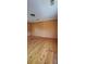 Bright room featuring hardwood floors and neutral-colored walls at 1406 High Sierra Dr, Lawrenceville, GA 30043