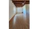 Expansive living area showcasing hardwood floors and natural light from large windows at 1406 High Sierra Dr, Lawrenceville, GA 30043