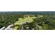 Beautiful aerial view of the golf course with a pond surrounded by forest and residences at 2277 Peachtree Rd # 503, Atlanta, GA 30309
