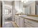 Bathroom featuring a vanity, sink, and access to the bedroom at 2277 Peachtree Rd # 503, Atlanta, GA 30309