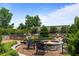 Inviting outdoor fire pit with stone surround and comfortable seating area surrounded by lush landscaping at 2277 Peachtree Rd # 503, Atlanta, GA 30309