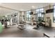 Well-equipped gym with multiple machines, free weights, and mirrored walls at 2277 Peachtree Rd # 503, Atlanta, GA 30309