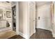 Hallway featuring stacked laundry and door at 2277 Peachtree Rd # 503, Atlanta, GA 30309