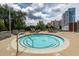 Relaxing hot tub with a stainless-steel grab rail and lounge chairs, offering a peaceful retreat at 2277 Peachtree Rd # 503, Atlanta, GA 30309