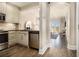 Stylish kitchen with stainless steel appliances and seamless access to the living area at 2277 Peachtree Rd # 503, Atlanta, GA 30309