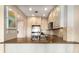 Well-lit kitchen featuring stainless steel appliances, cabinets, and decorative backsplash at 2277 Peachtree Rd # 503, Atlanta, GA 30309