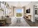 Inviting living room features balcony, elegant lighting, and stylish decor, creating a cozy atmosphere at 2277 Peachtree Rd # 503, Atlanta, GA 30309