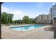 Resort-style pool area with ample lounge seating and a view of the surrounding cityscape at 2277 Peachtree Rd # 503, Atlanta, GA 30309