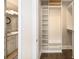 Spacious walk-in closet with custom shelving and access to the bathroom at 2277 Peachtree Rd # 503, Atlanta, GA 30309