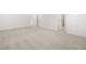 Expansive bedroom with neutral carpet, white trim and doors leading to en-suite bath at 2831 Centerville Rosebud Rd, Snellville, GA 30039