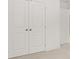 Neutral carpeted hallway with a double door closet at 2831 Centerville Rosebud Rd, Snellville, GA 30039