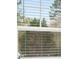 Trees and foliage are seen from the window at 2831 Centerville Rosebud Rd, Snellville, GA 30039