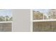 A view of multiple windows with closed blinds and natural light at 2831 Centerville Rosebud Rd, Snellville, GA 30039
