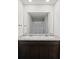 Bathroom with double sinks, granite countertops, and a large mirror at 3038 Chris Cir, Villa Rica, GA 30180