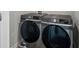 Modern laundry room showcases a sleek Samsung washer and dryer set at 3038 Chris Cir, Villa Rica, GA 30180