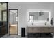 Bathroom featuring a double sink, a modern vanity, and an illuminated mirror at 4031 Oak Forest Cir, Marietta, GA 30062