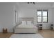 Serene bedroom with wood floors, neutral colors, and ample natural light at 4031 Oak Forest Cir, Marietta, GA 30062