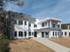 Bright and airy modern home with multi-level design, balcony, and a fresh, clean exterior at 4031 Oak Forest Cir, Marietta, GA 30062