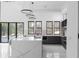 Bright, modern kitchen with a marble island, stainless steel appliances, and large windows overlooking the pool at 4031 Oak Forest Cir, Marietta, GA 30062