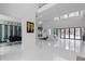 Open floor plan featuring a spacious living room with pool view, dining area and high ceilings at 4031 Oak Forest Cir, Marietta, GA 30062