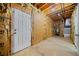 Unfinished basement with concrete floors and exposed ductwork and wooden ceiling at 1160 Chateau Ter, Mcdonough, GA 30253