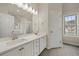 Bathroom features double vanity and a large mirror at 1160 Chateau Ter, Mcdonough, GA 30253